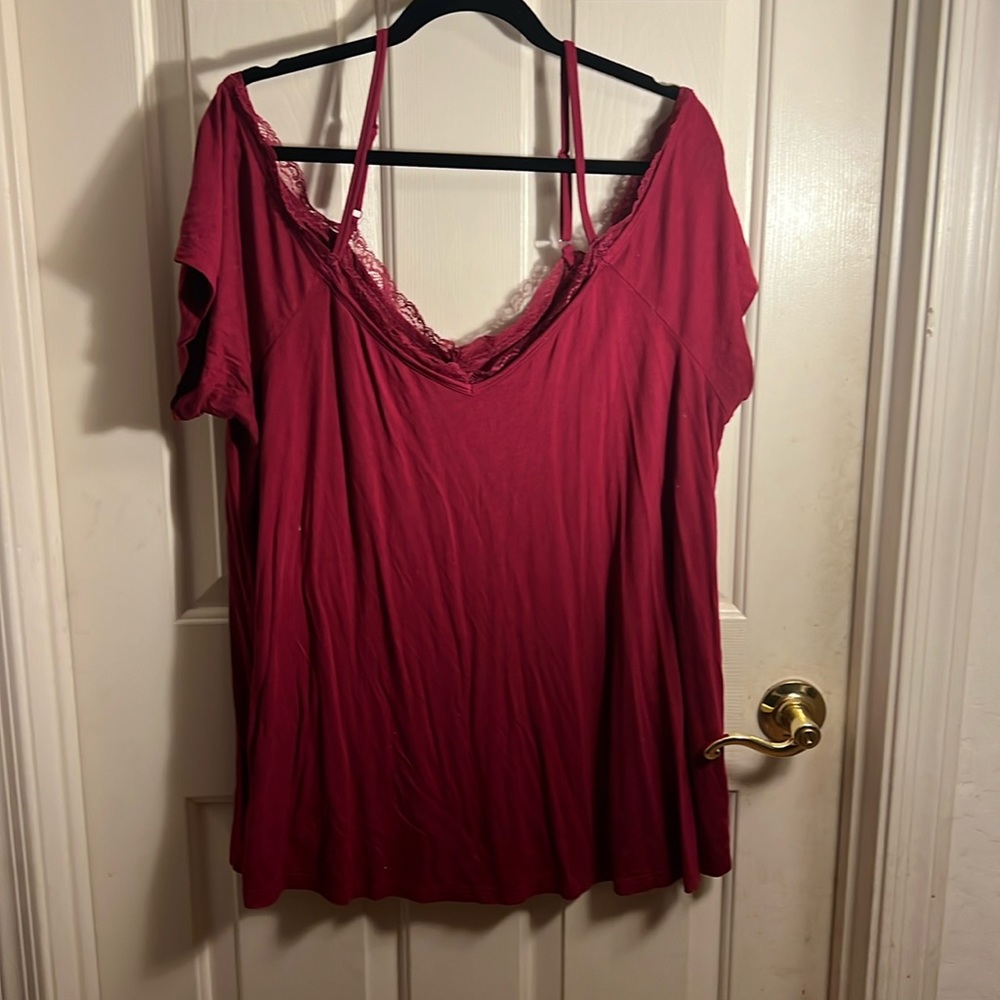 Torrid super soft cold shoulder tee with lace neckline trim. Size 2